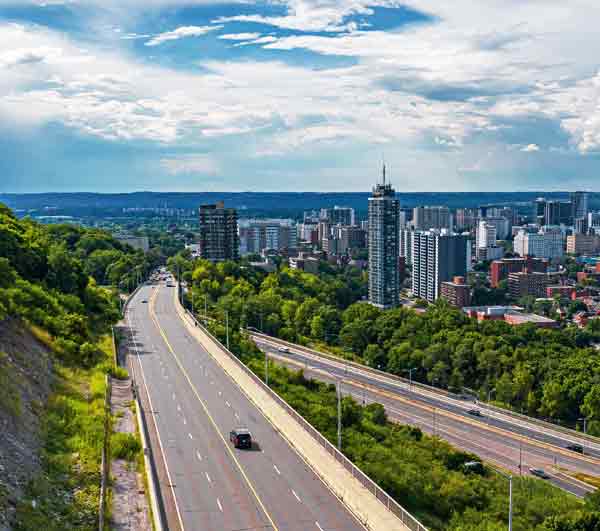 Hamilton skyline and cars driving on highway