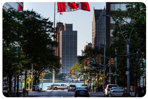 cars driving in downtown Windsor near lae Ontario