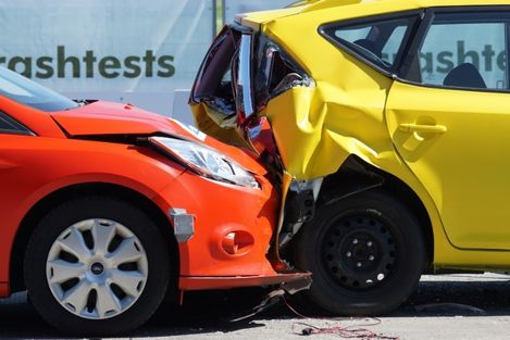 red and yellow car crash test